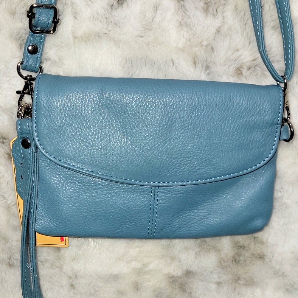 Light blue 💙 cowhide leather crossbody purse. Very soft.